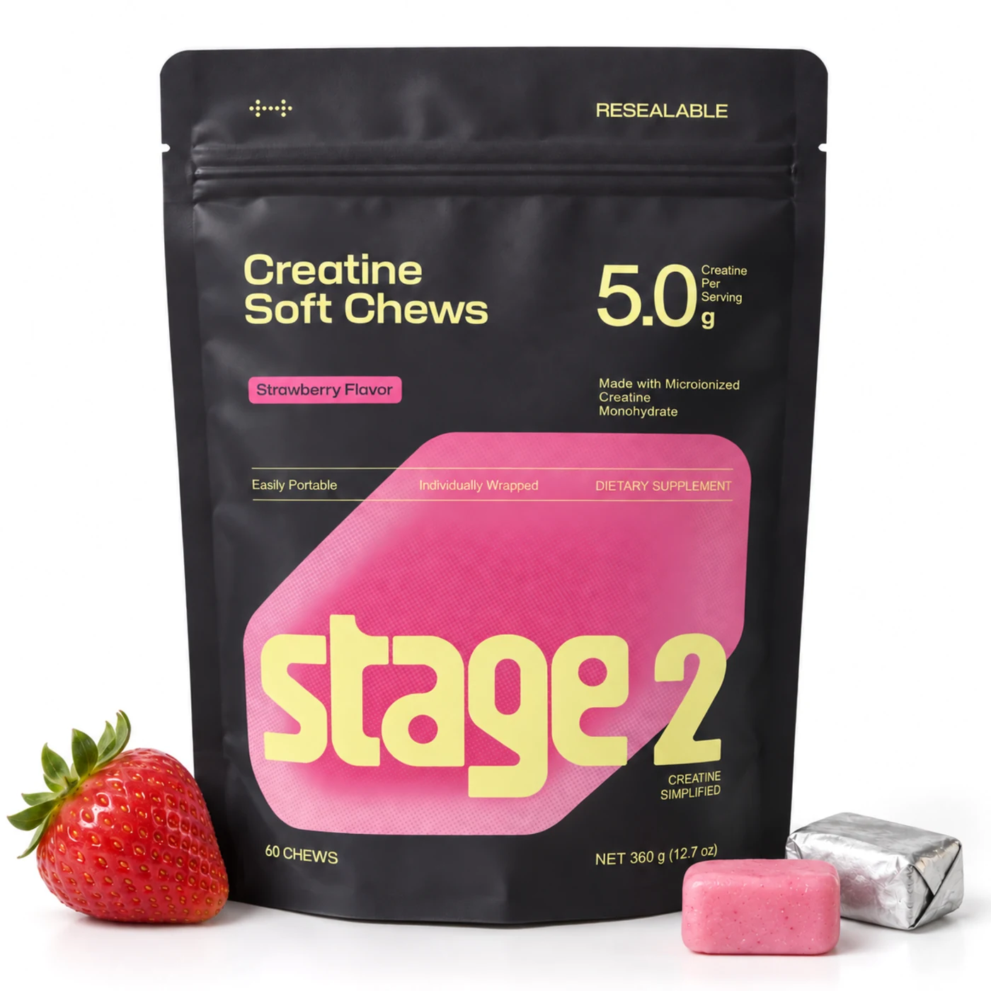 Stage 2 Creatine Soft Chews pouch with a fresh strawberry, an unwrapped chew and a foil-wrapped chew